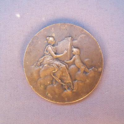Médaille en bronze cinquantenaire des grands magasins du Louvre daniel dupui